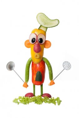 Yalıtılmış zemin üzerine kaşık ile sebze Şef