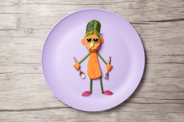 Cook sebze tabağı ve ahşap masa ile yapılan