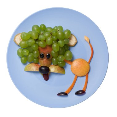 Mavi plaka üzerinde yapılan komik meyve aslan