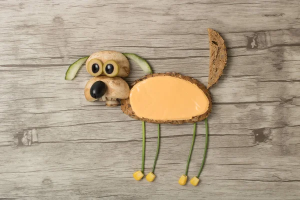 Surprised dog made with bread and vegetables