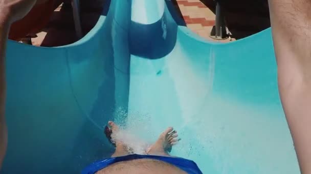 Dizzy descent from the water slide. Slow motion video 120 frames per second