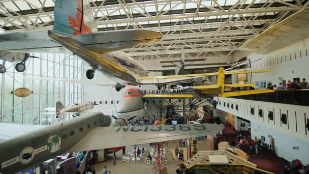 Washington DC, USA, October 2017: Aircraft and other large-scale exhibits in National Air and Space Museum. Low angle wide lens shot — Stock Video