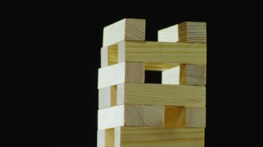 El ahşap blok kuleden çeker. Djanga içinde oynamaya. Masa oyunları kavramı