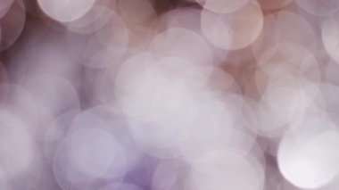 Güzel ışık arka plan yavaş yavaş dönen bokeh,