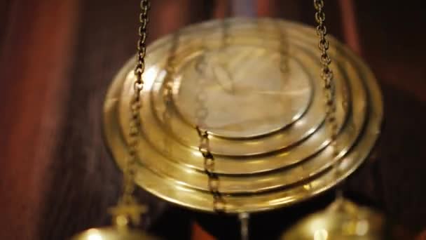 Pendulum of the ancient clock. Low angle shot — Stock Video