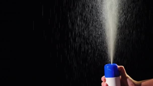 Spray sprayed up on black background — Stock Video