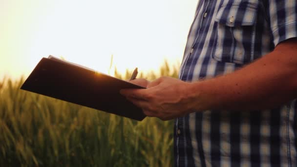 Farmer signs the document and shakes hands with partner — Stock Video