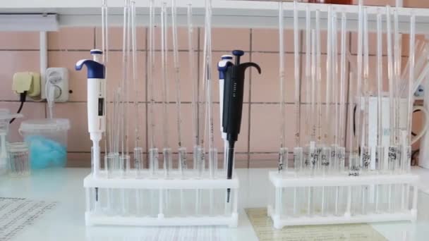 Glass Tubes Syringes Flasks Study Analyzes Table Row Medical Devices — Stock Video