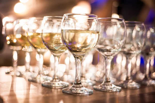Rows of wine glasses on corporate party celebration — Stock Photo, Image