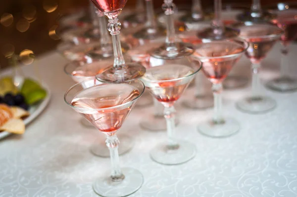 Luxury Banquet table with a pyramid of champagne glasses with ch — Stock Photo, Image