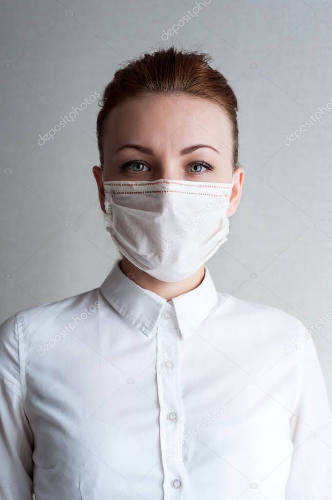Portrait of a girl in a medical mask. Close u