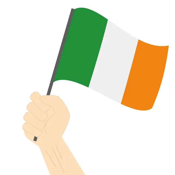 Hand halten und die Nationalflagge Irlands hissen — Stockvektor