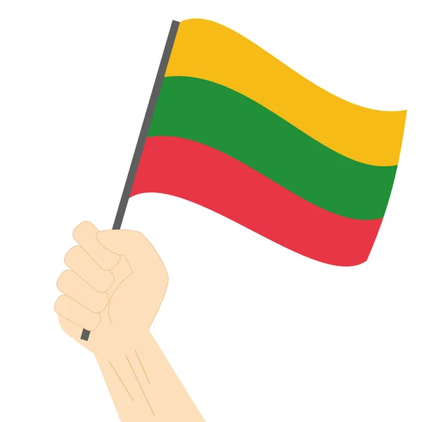 Tangan memegang dan mengangkat bendera nasional Lithuania - Stok Vektor