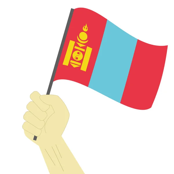 Mão segurando e levantando a bandeira nacional da Mongólia —  Vetores de Stock