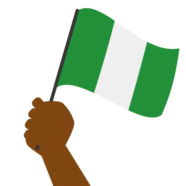 Hand halten und die Nationalflagge Nigerias hissen — Stockvektor