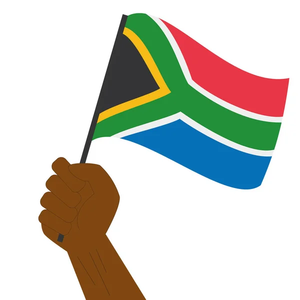 Hand holding and raising the national flag of South Africa — Stock Vector