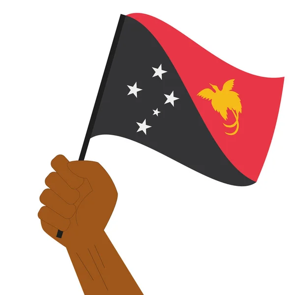 Hand holding en verhoging van de nationale vlag van Papoea-Nieuw-Guinea — Stockvector