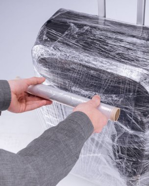 Adam bavulu sarar koruyucu şeffaf film
