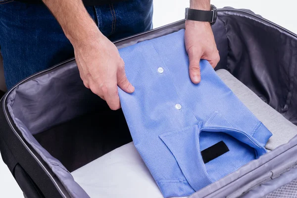 Man Packing Clothes Travel Bag Vacation — Stock Photo, Image