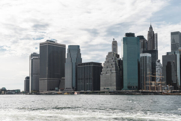 New York, USA - September 20, 2015: View of the world center of Manhattan in New York City from Brooklyn.