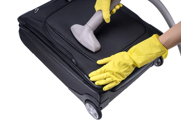 Handstofzuiger Reinigt Zwarte Koffer Met Grijze Stofzuiger Stockfoto