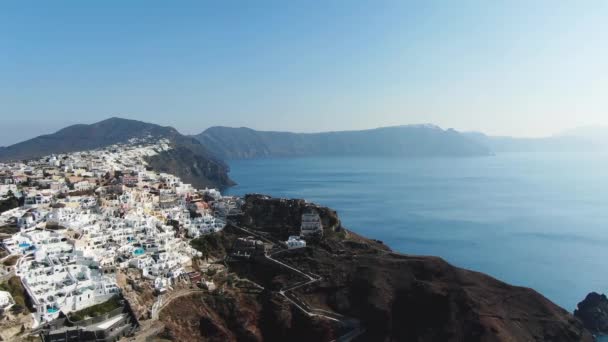 Flying Over Famous Blue Domed Church In Oia On Santorini Island In Greece — Stock Video