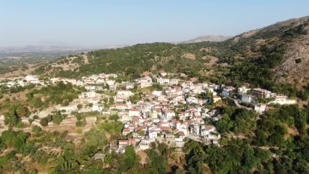 Drone Descending Fast Towards MOUNTAIN VILLAGE CHURCH CRETE GREECE — Stock Video