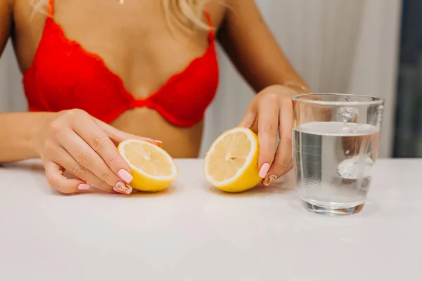 woman in lingerie and lemon