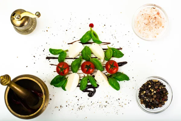 Festive Christmas appetizer caprese salad shaped Christmas tree — Stock Photo, Image