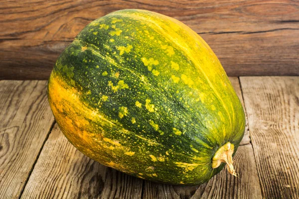 Fresh Tasty Sweet Green Pumpkin on Wooden Background — Stock Photo, Image