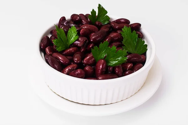 Fasulye, baharatlar ve köri beyaz salata kasesi