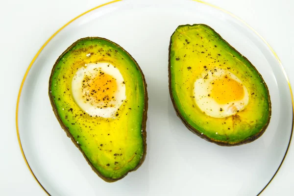 Avocados, Baked with Quail Egg, Salt, Pepper, Lemon