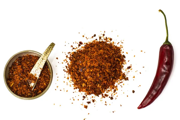 Chili, red pepper flakes, corns and chili powder — Stock Photo, Image