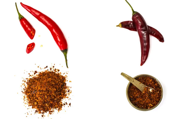 Chili, red pepper flakes, corns and chili powder — Stock Photo, Image