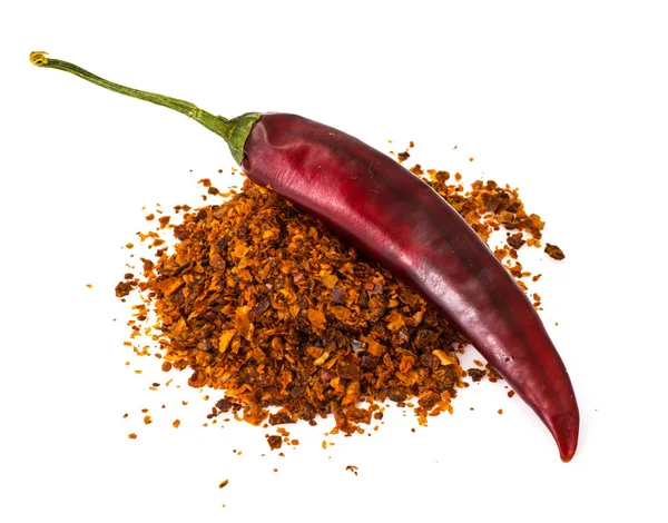 Chili, röd paprika flingor, liktornar och chilipulver — Stockfoto