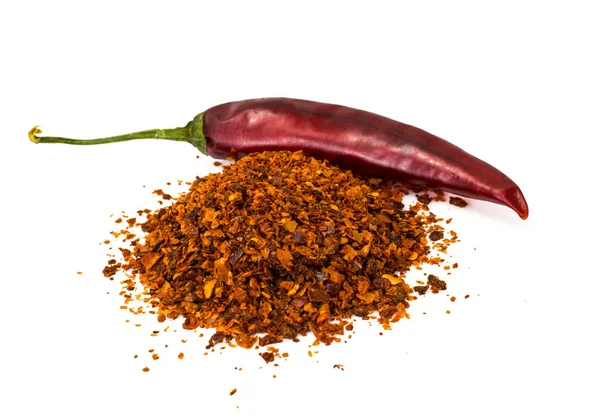 Chili, röd paprika flingor, liktornar och chilipulver — Stockfoto