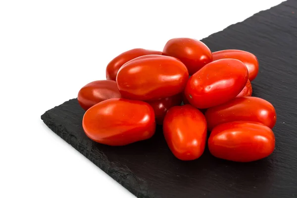Kleine rode langwerpige tomaten — Stockfoto