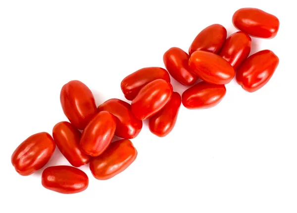 Pequenos tomates oblongos vermelhos — Fotografia de Stock