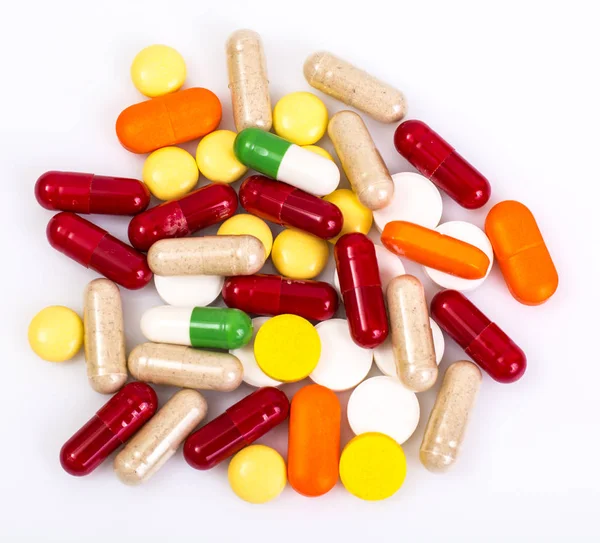 Фармацевтичні барвисті таблетки, капсули, мультивітамінні засоби — стокове фото