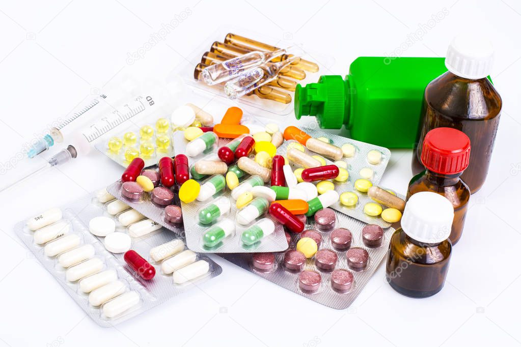 Drugstore Vitamins: round gelatin capsules in a bottle of dark g