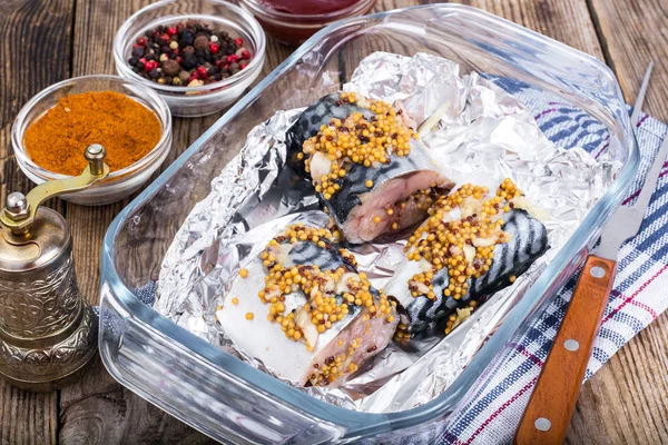 Mackerel in mustard sauce in foil for baking — Stock Photo, Image