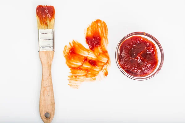 Absztrakt brush ketchup fehér háttér — Stock Fotó