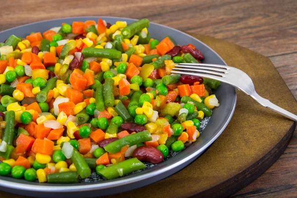 Mix of roasted vegetables in pan Stock Photo