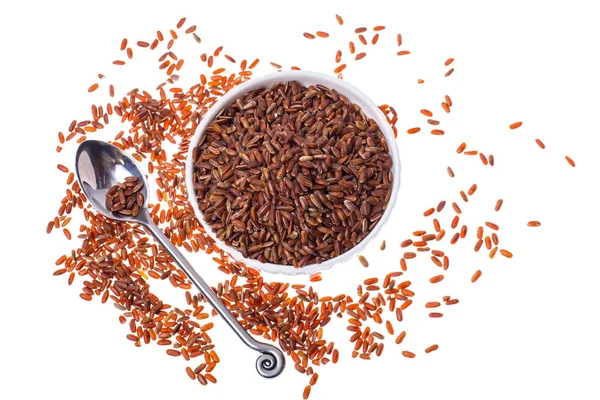 Beyaz zemin üzerinde kırmızı pirinç izole