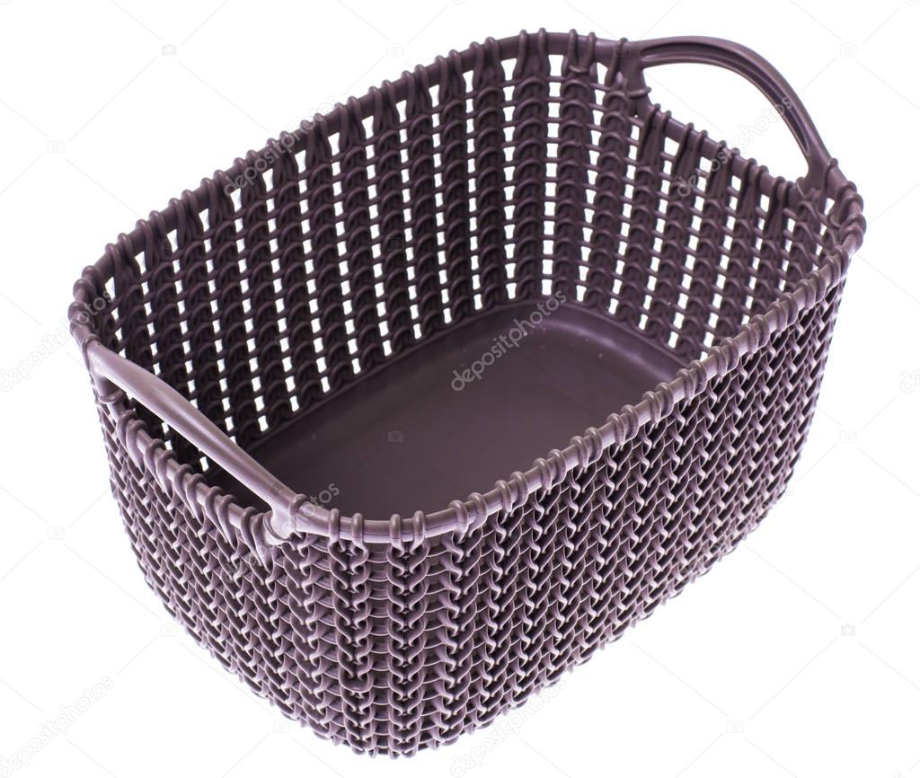 Gray plastic basket on white background