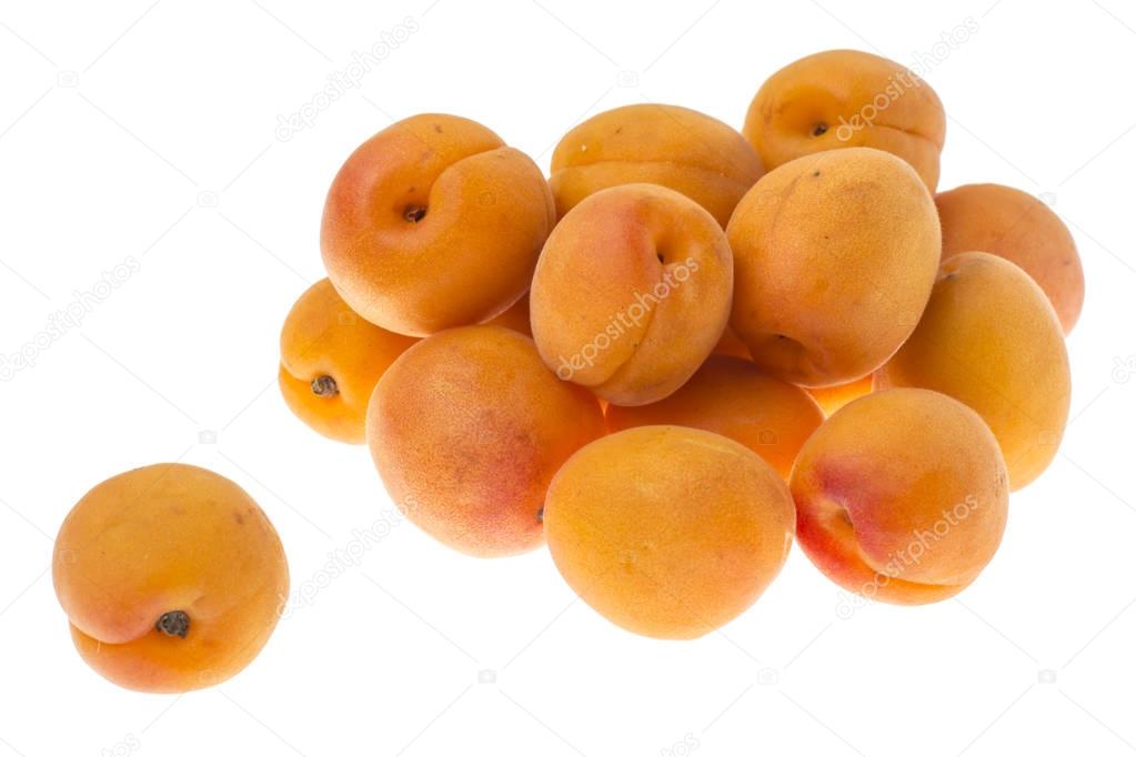 Ripe fresh small apricots isolated on white background.