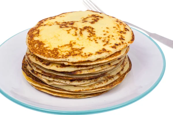 Crispy thin pancakes on plate, light background — Stock Photo, Image