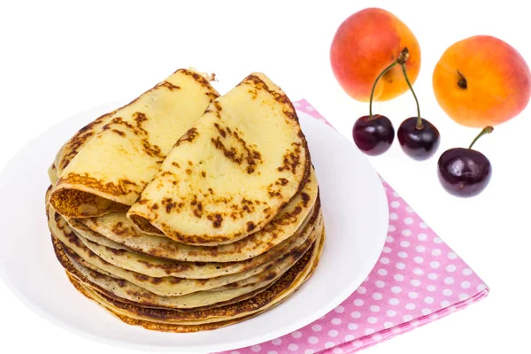 Crispy thin pancakes on plate, light background — Stock Photo, Image