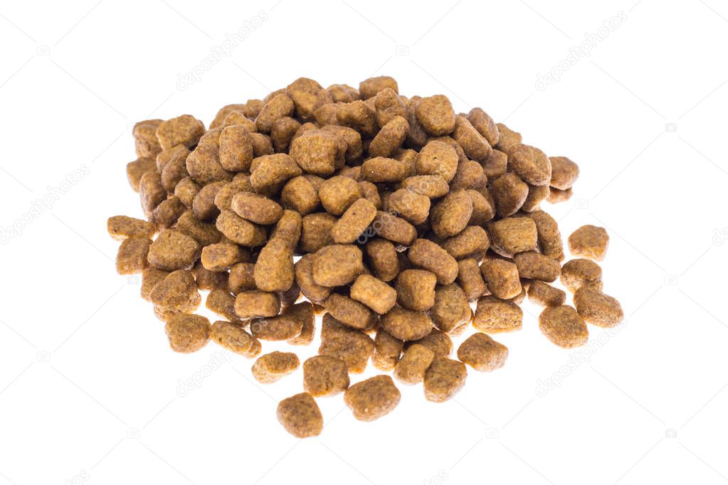 Pile of granulated animal feeds on white background