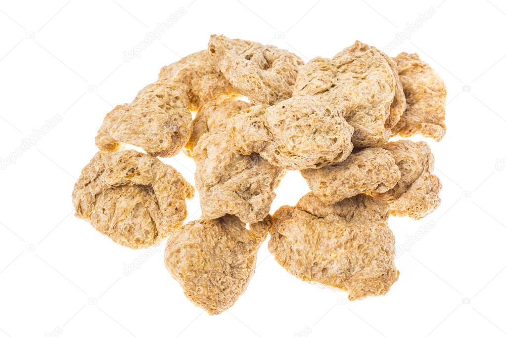 Raw dehydrated soy meat  on white background.